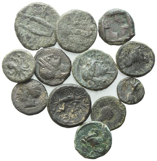 Lot of 12 Greek Æ coins to be catalogued. Lot sold as is, no returns.
