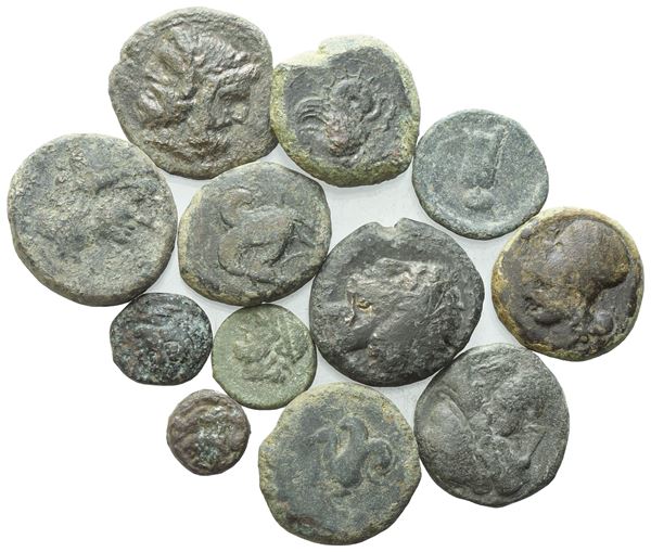 Lot of 12 Greek Æ coins to be catalogued. Lot sold as is, no returns.