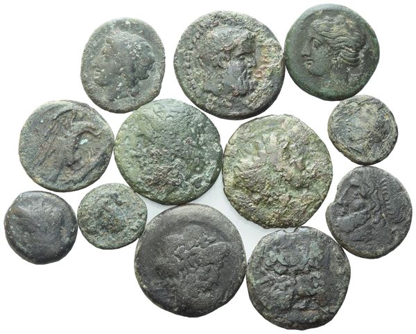 Lot of 12 Æ coins to be catalogued. Lot to be sold as is. No returns.