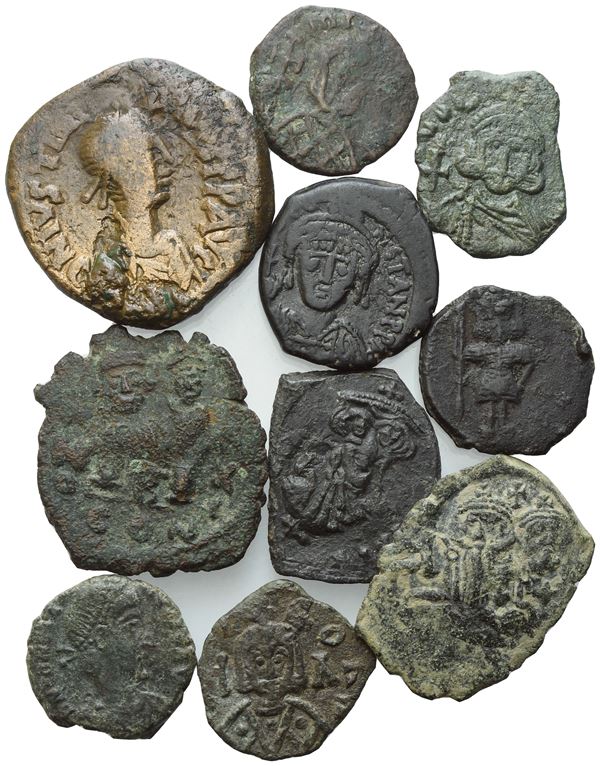  Lot of 10 Byzantine Æ coins to be catalogued. Lot to be sold as is, no returns.