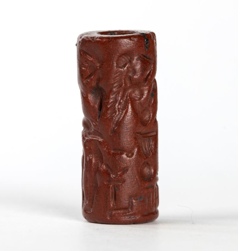 A Roman gnostic red jasper magical cylindrical seal. Erotic scene.