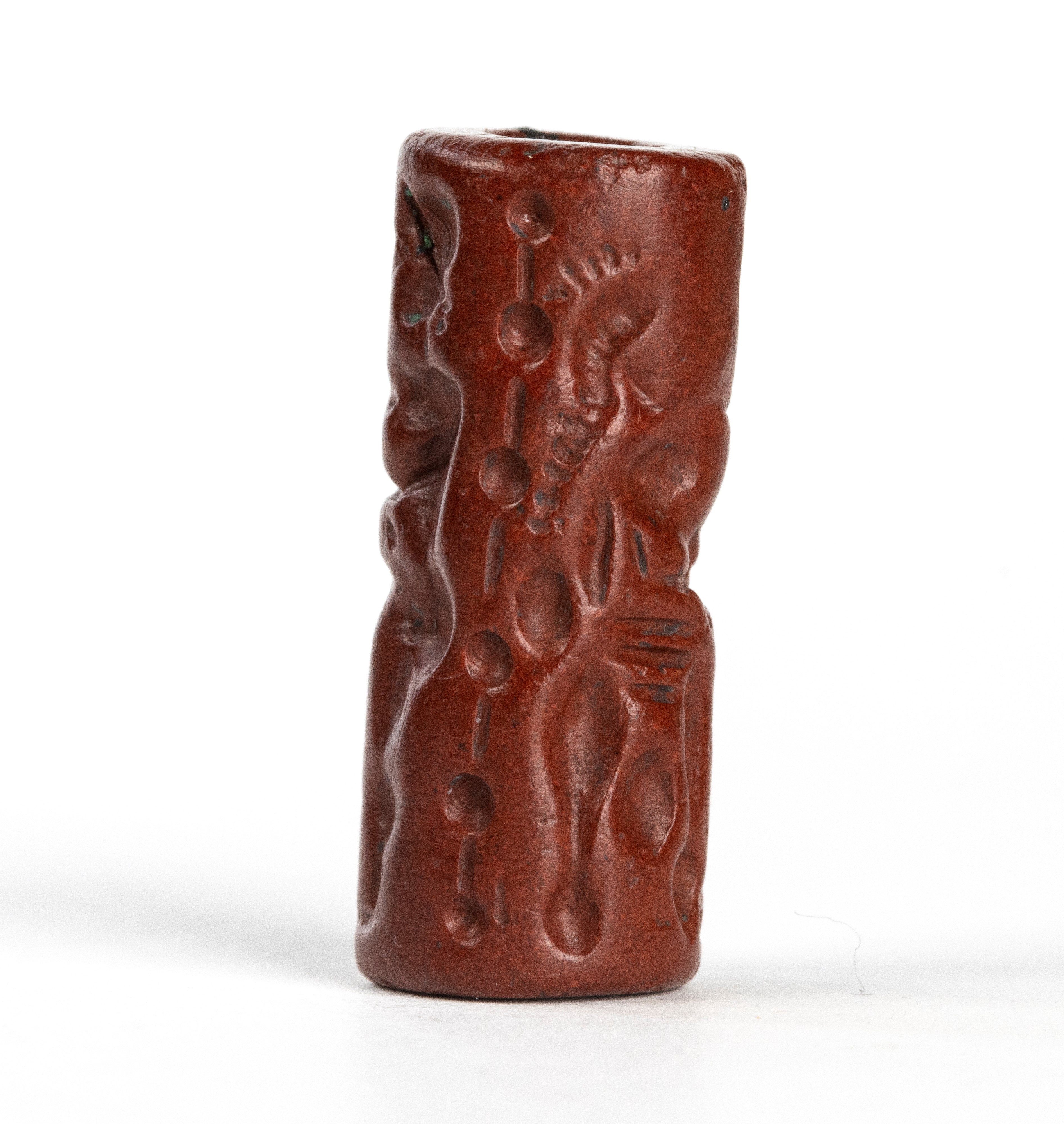 A Roman gnostic red jasper magical cylindrical seal. Erotic scene.
