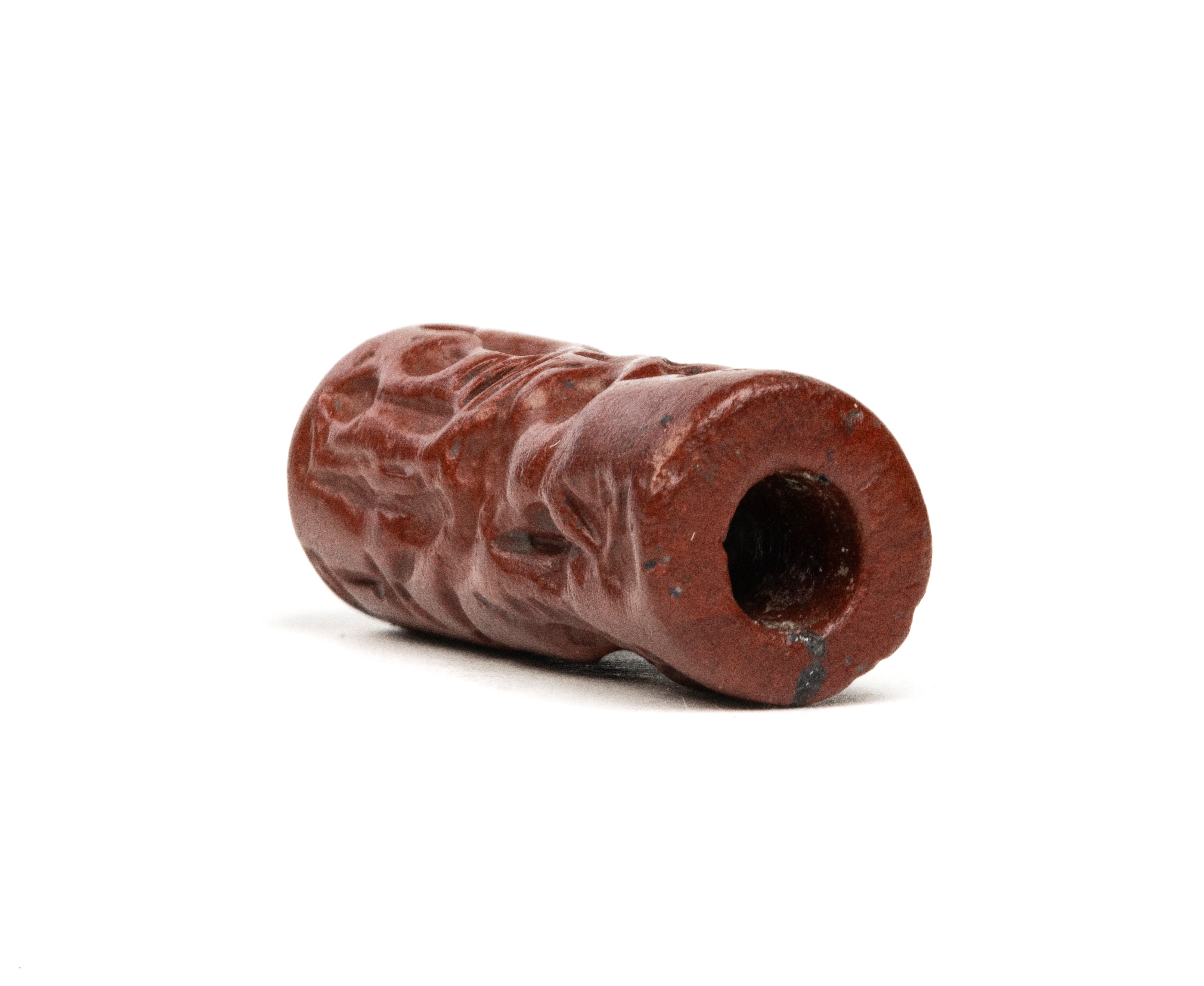 A Roman gnostic red jasper magical cylindrical seal. Erotic scene.