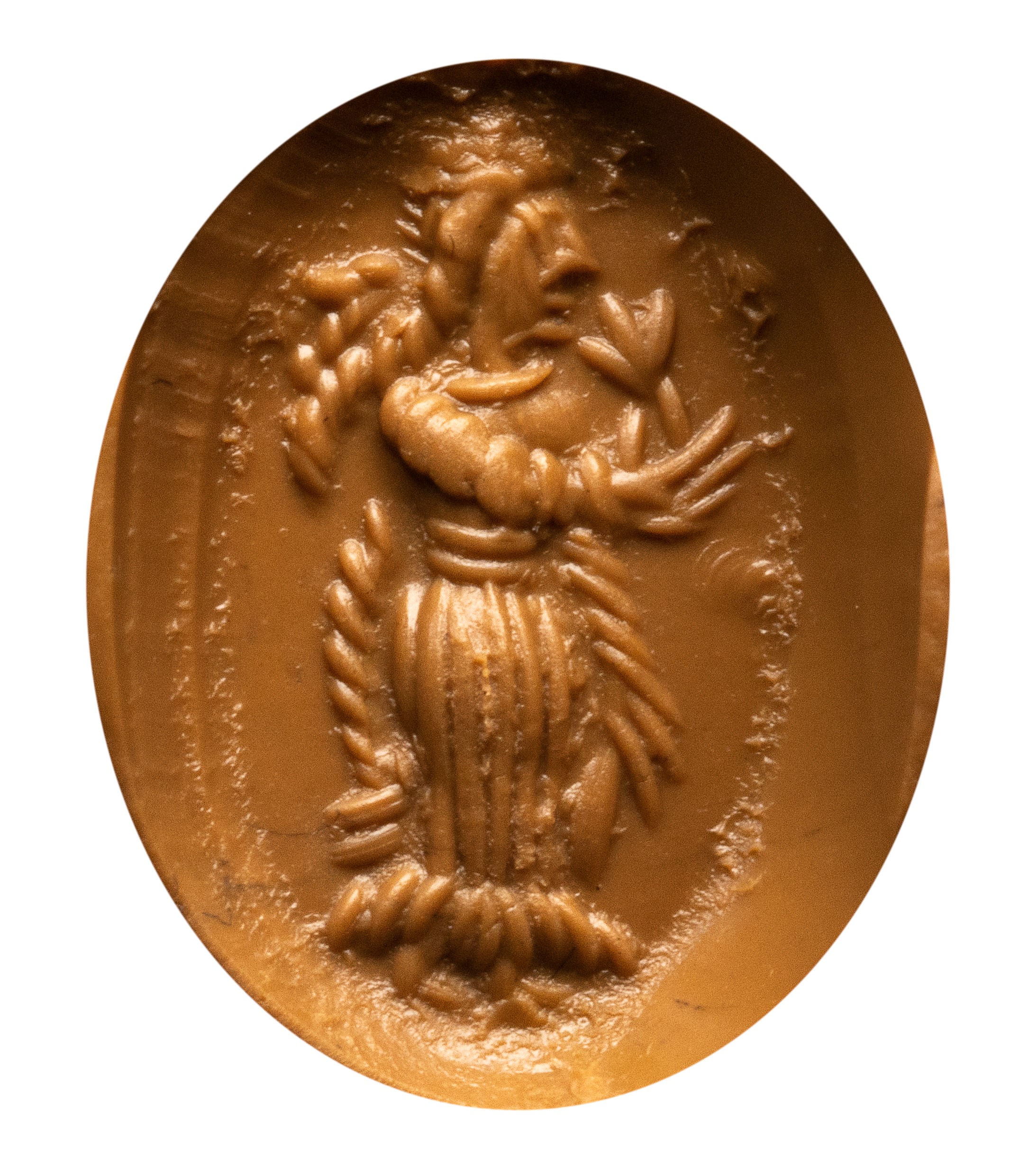 A Sasanian carnelian stamp seal. Woman with a flower.