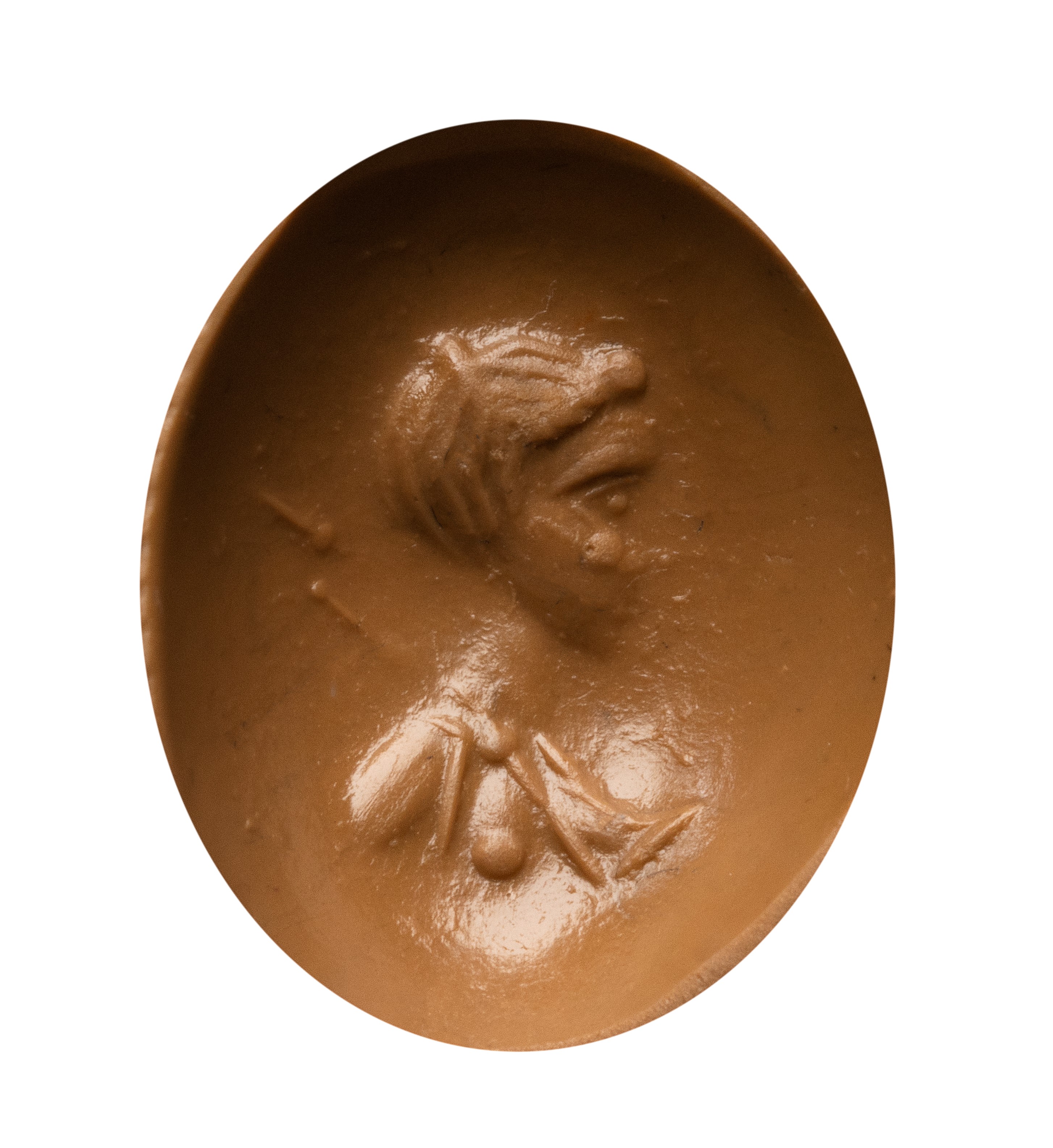 A Roman cabochon carnelian intaglio. Female bust.