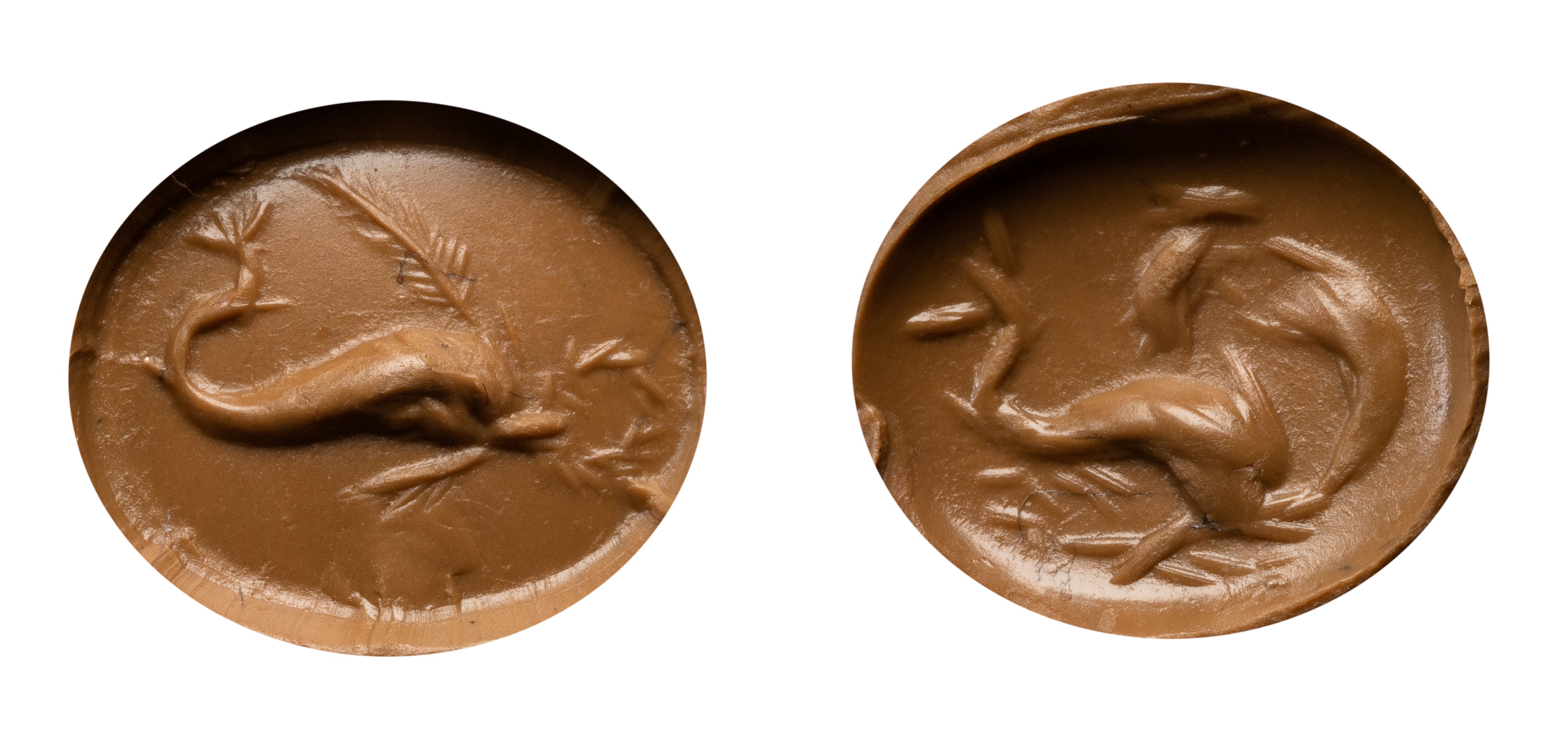 A lot of 2 carnelian Roman intaglios. Sea scenes.