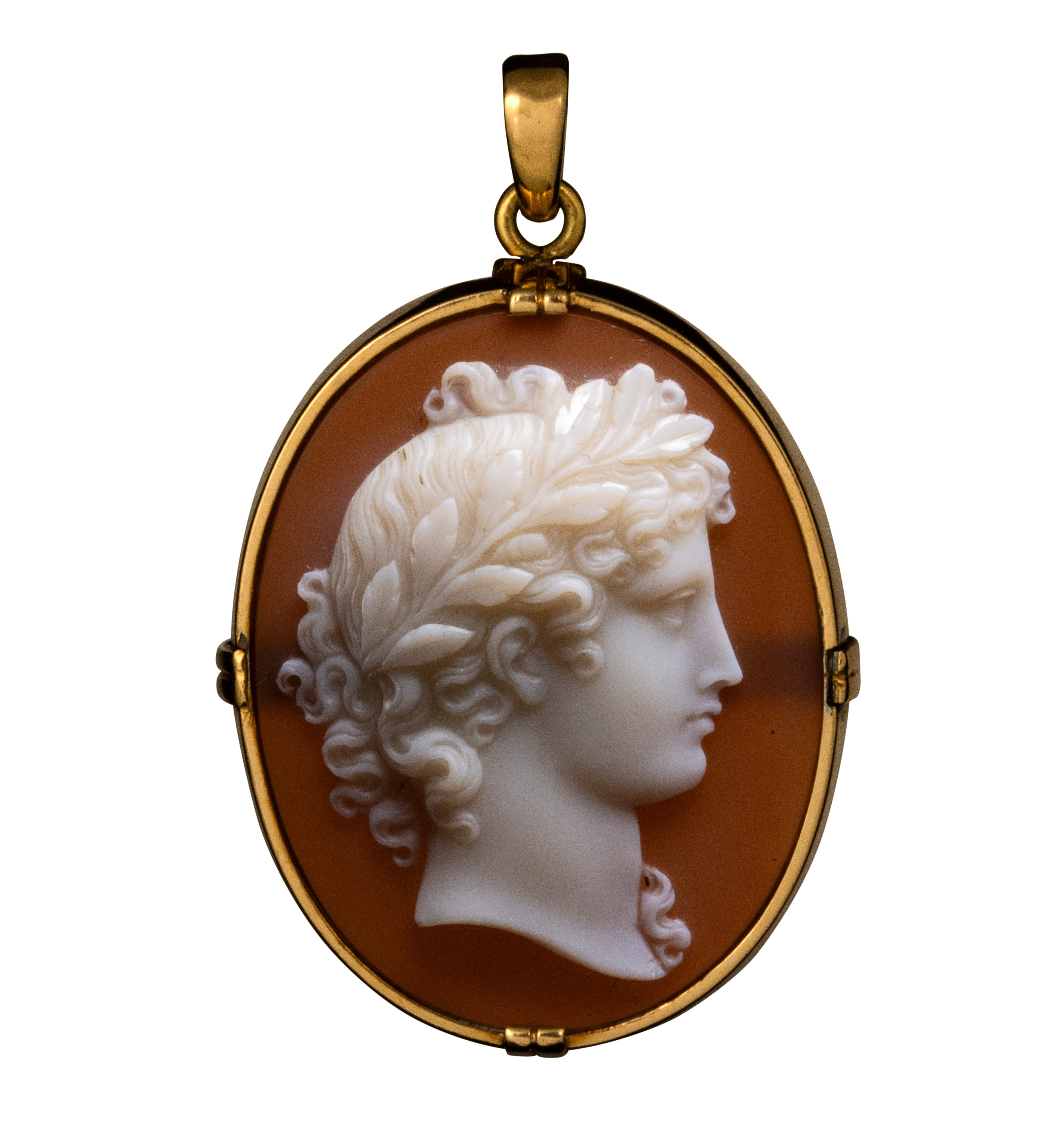 An early Victorian agate cameo set in a gold pendant. Laureated head of Apollo.
