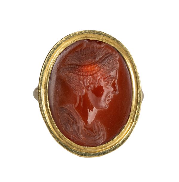 A fine Roman carnelian intaglio set in a modern gold ring. Portrait of the empress Sabina.