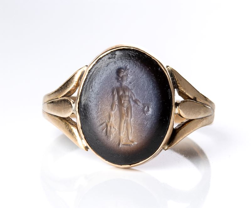 A Roman nicolo intaglio set in a later gold ring. Bonus Eventus.