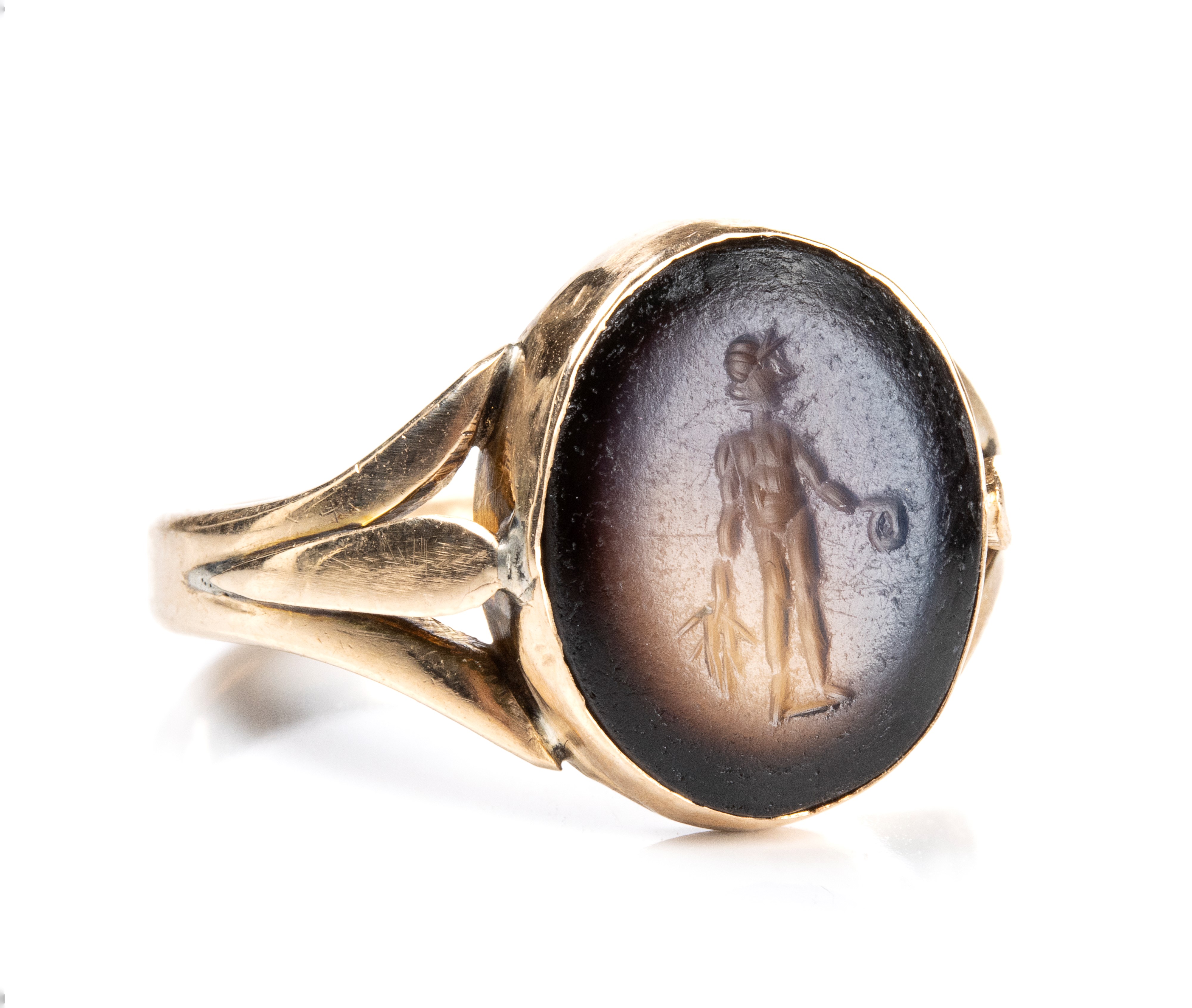 A Roman nicolo intaglio set in a later gold ring. Bonus Eventus.