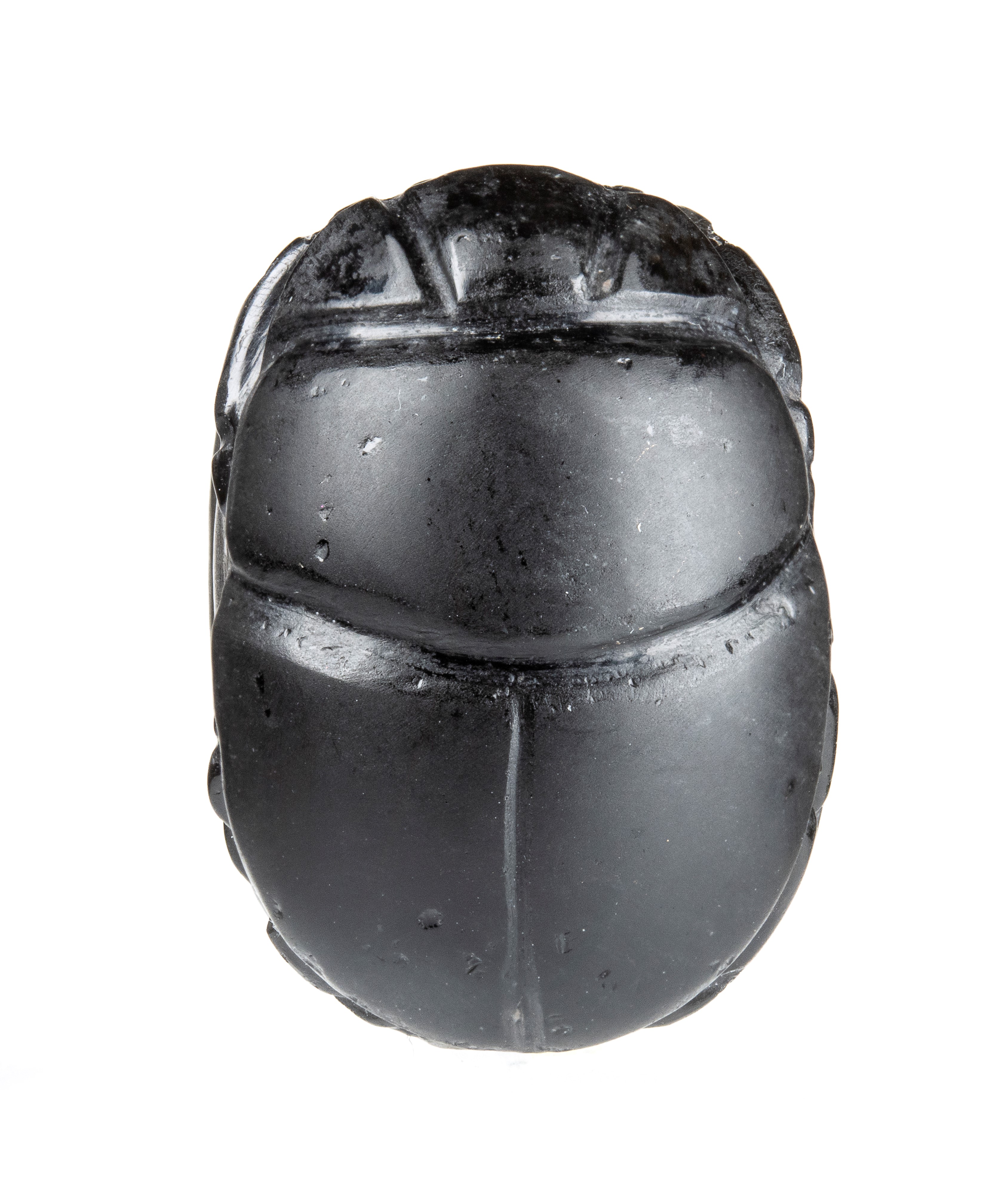 A large black jasper Phoenician engraved scarab.