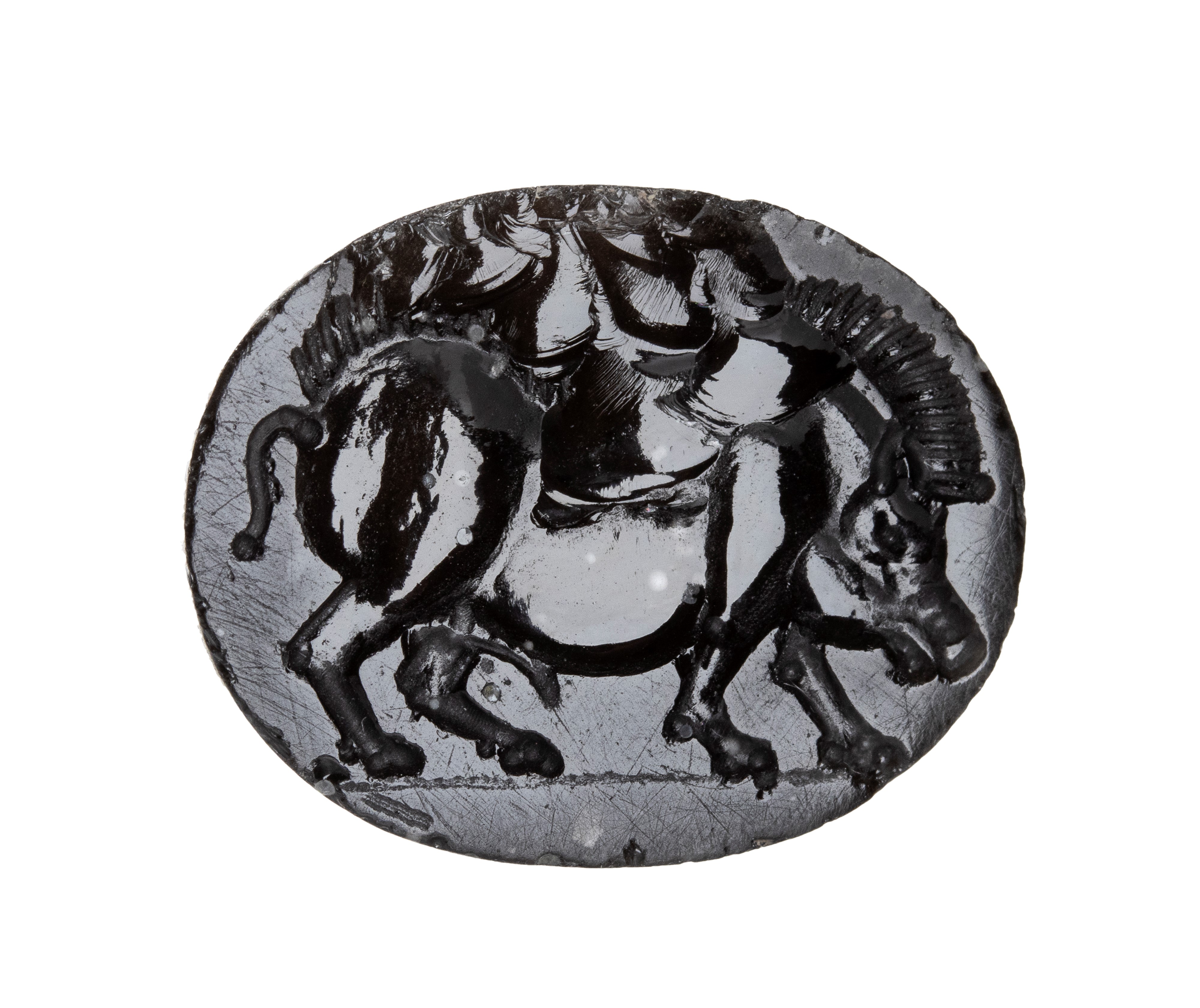 A large italic obsidian intaglio. Boar.