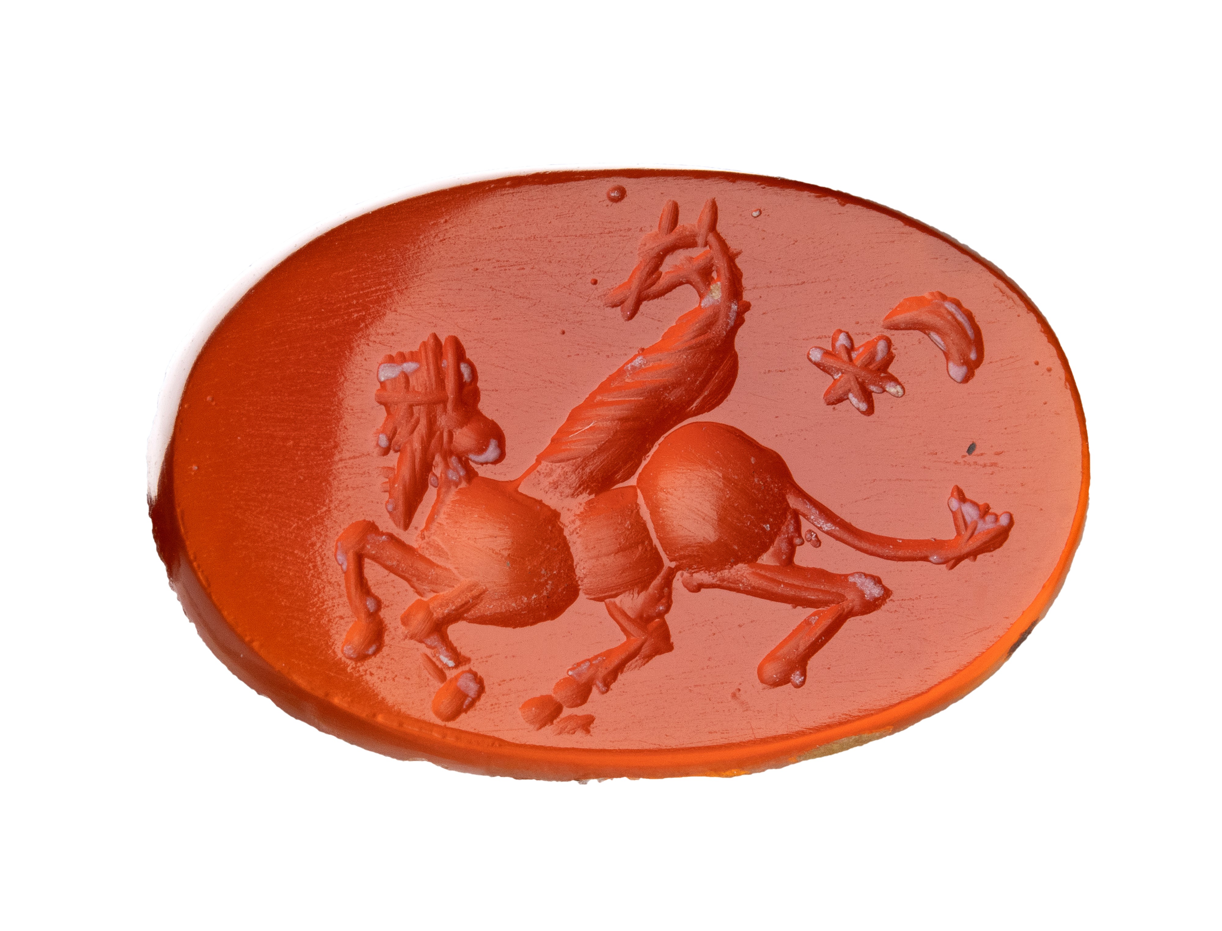 A Sasanian carnelian intaglio. Hybrid figure with attributes.