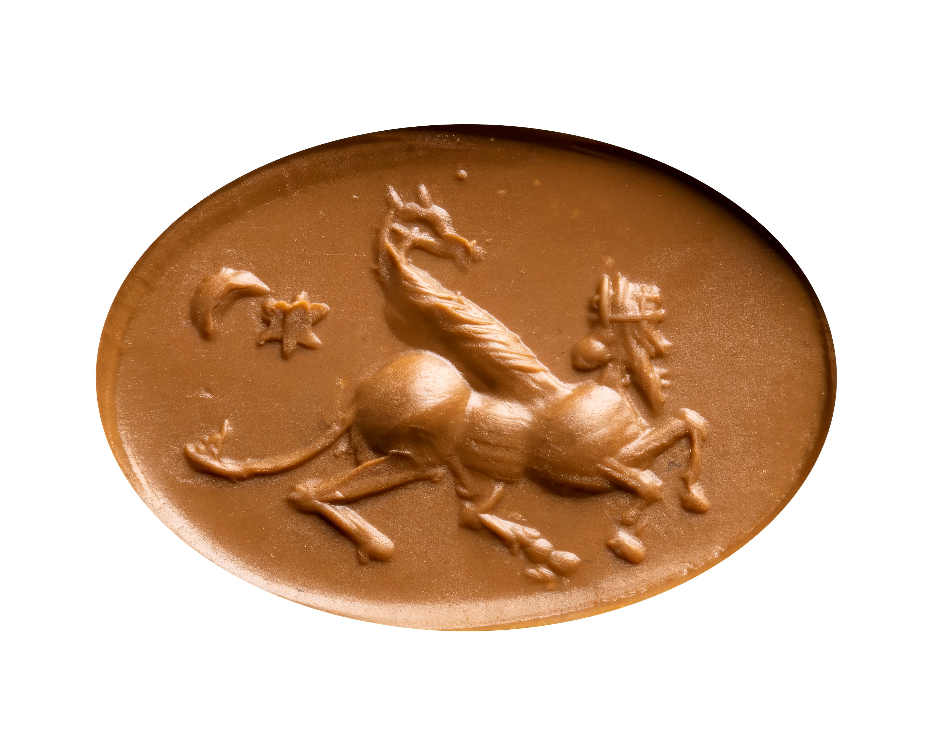 A Sasanian carnelian intaglio. Hybrid figure with attributes.