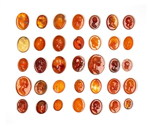 Lot of 35 postclassical carnelian and agate intaglios. Various bust portraits.