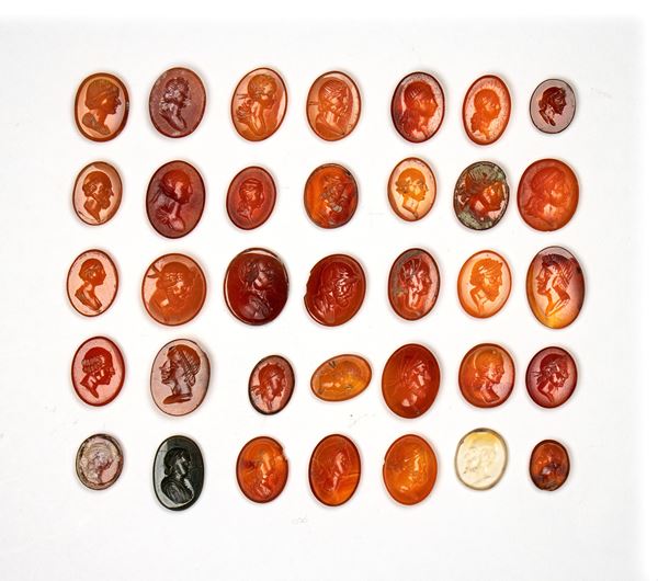 Lot of 35 postclassical carnelian and agate intaglios. Various bust portraits.