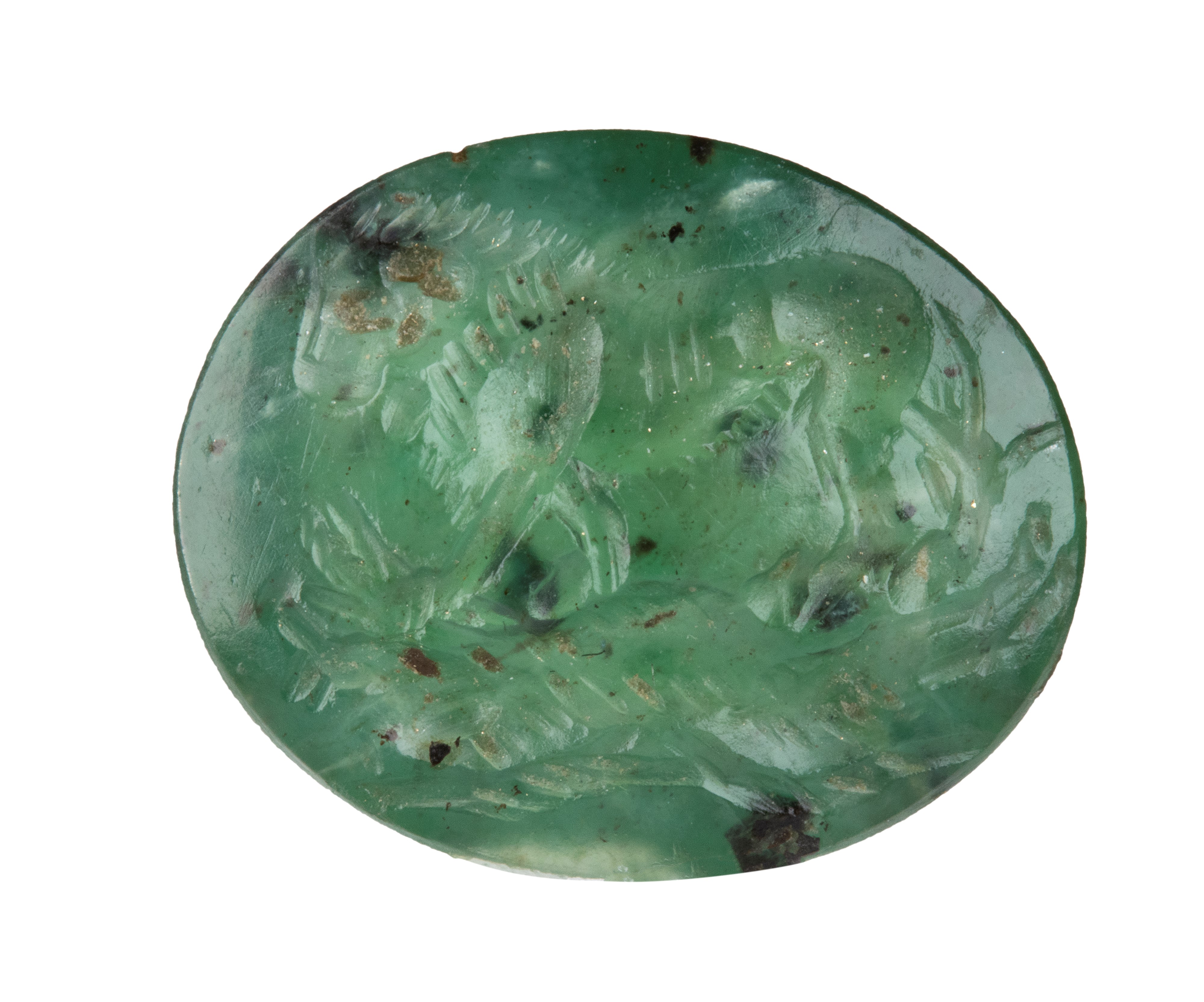 A Roman green chalcedony intaglio. Lion killing a boar.