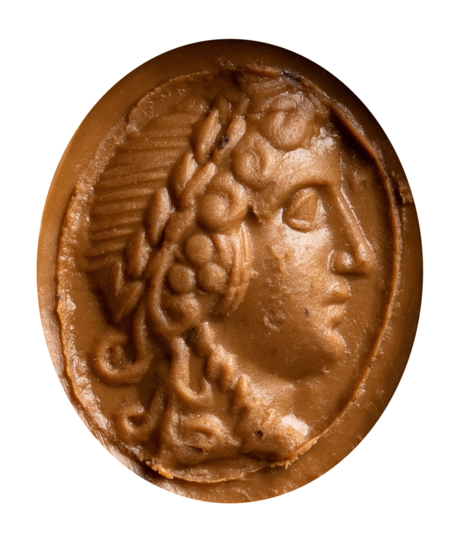 A Roman gold ring set with a nicolo intaglio. Head of Dyonisus.