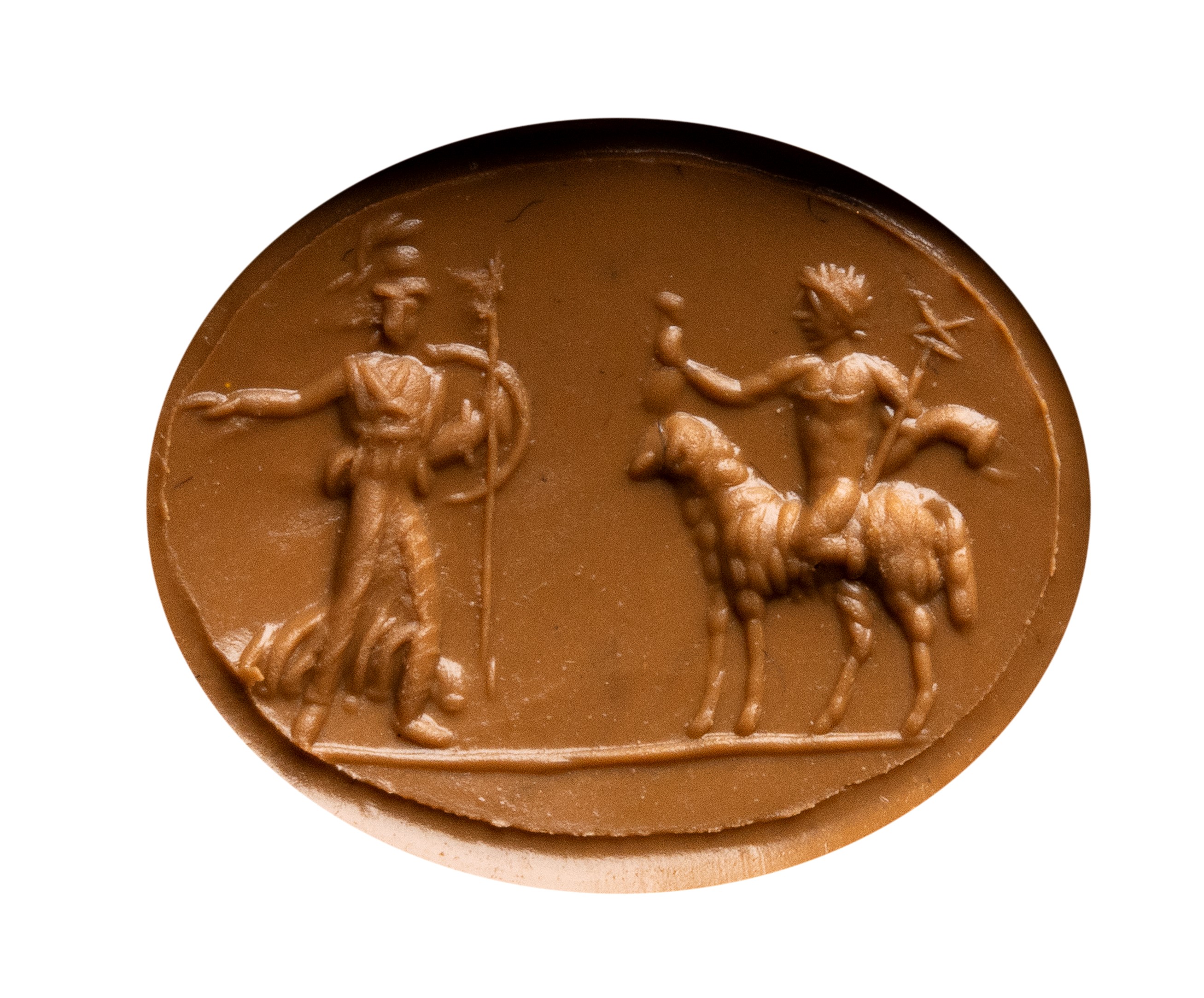 A Roman gold ring set with a red jasper intaglio. Hermes and Athena.