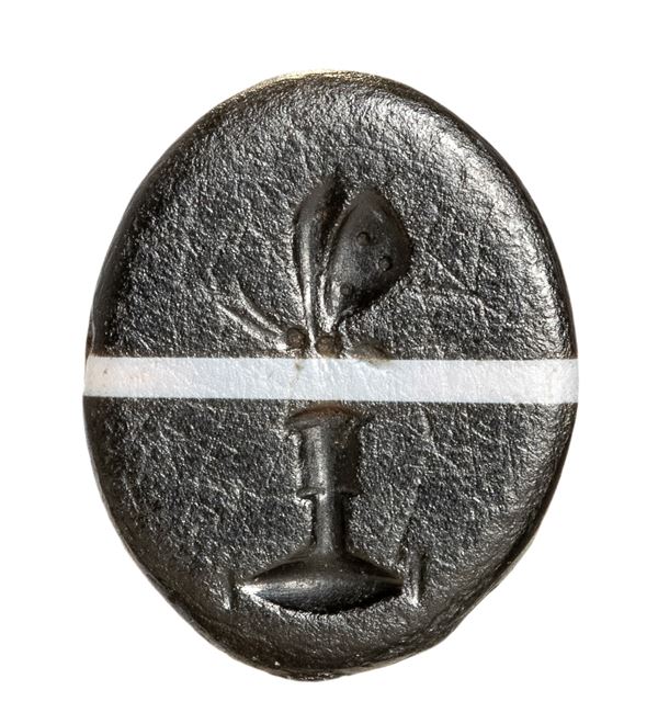 A Roman banded agate intaglio. Allegorical emblema with a butterfly.