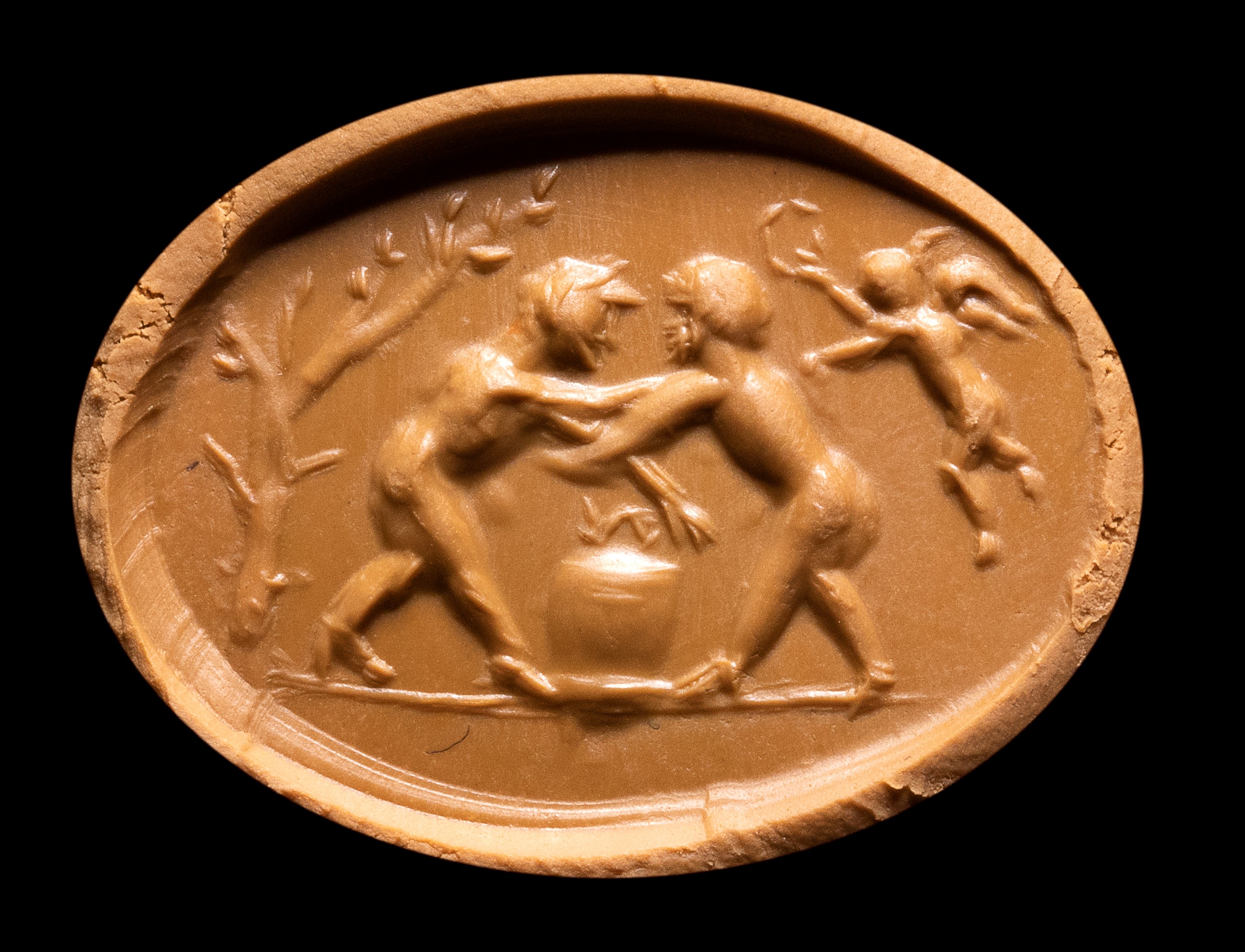 A Roman red jasper intaglio. Fight scene.