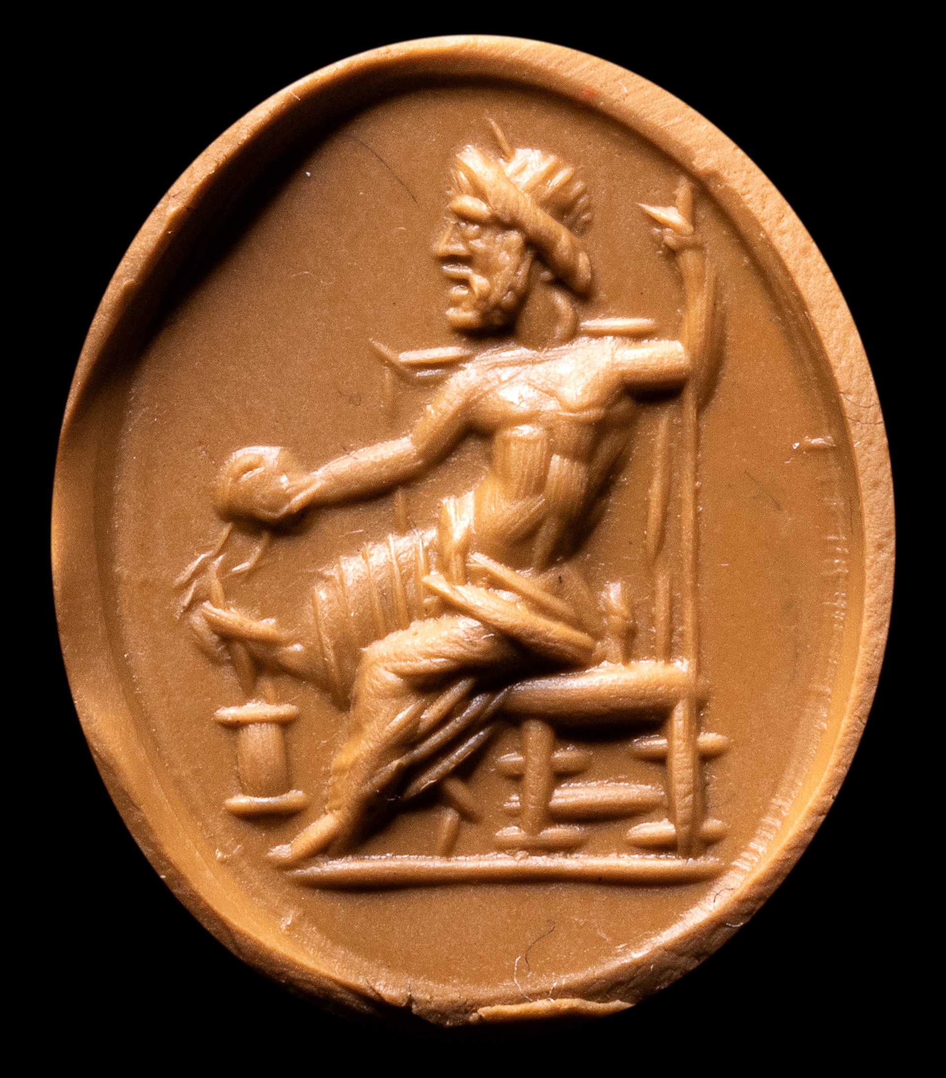 A Roman carnelian intaglio. Seated Zeus.