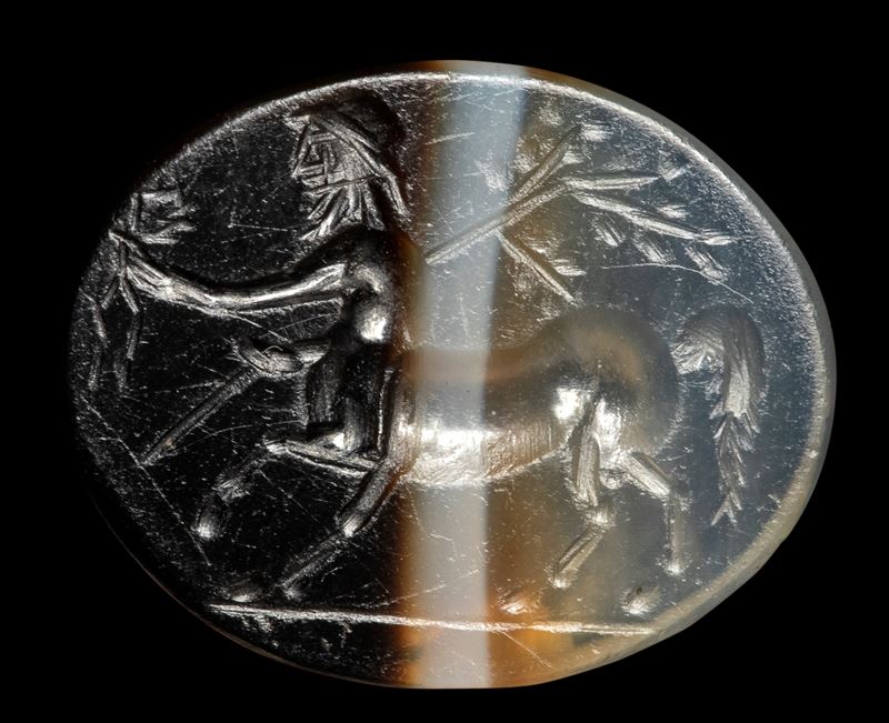 A Roman banded agate intaglio. Centaur.