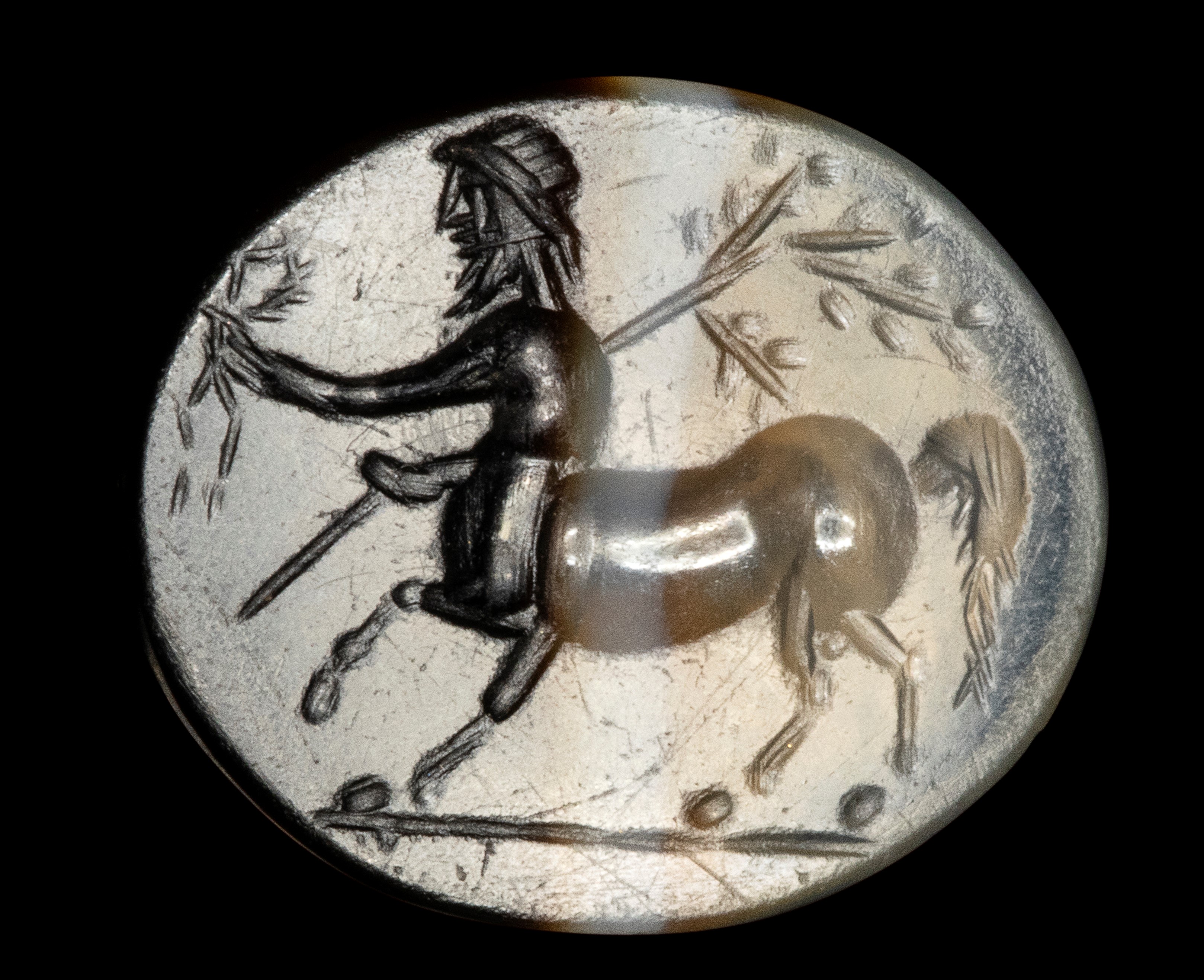 A Roman banded agate intaglio. Centaur.