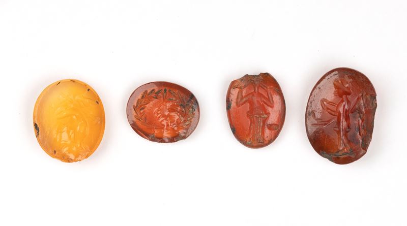 Lot of 4 Roman carnelian intaglios. Various subjects.