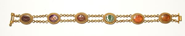 A Roman gold bracelet with six hardstones intaglios. Various subjects.
