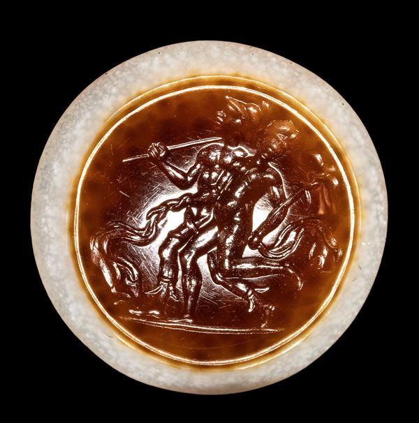 A "magical eye" agate intaglio. Two figures with attributes.