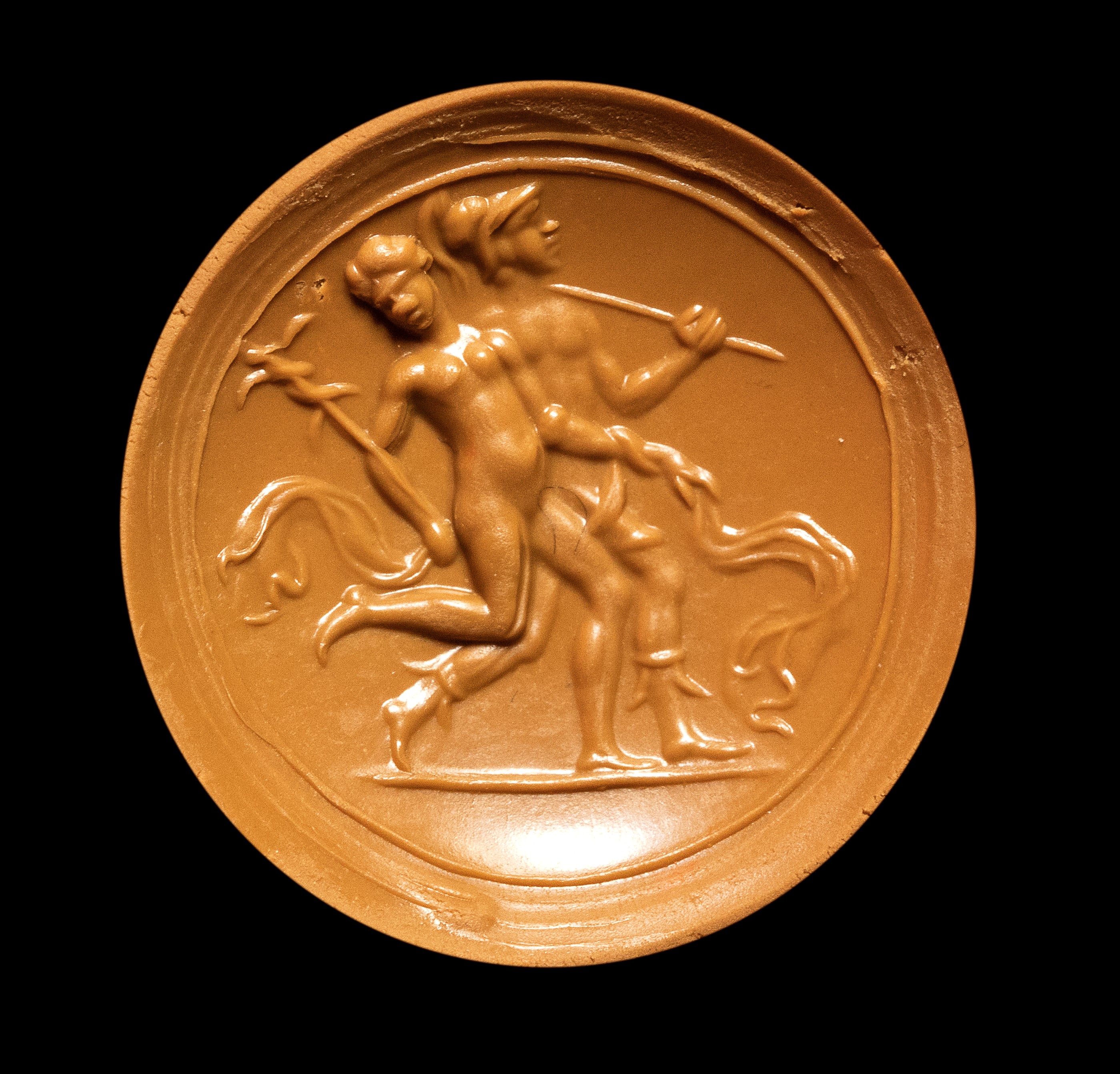 A 'magical eye' agate intaglio. Two figures with attributes.