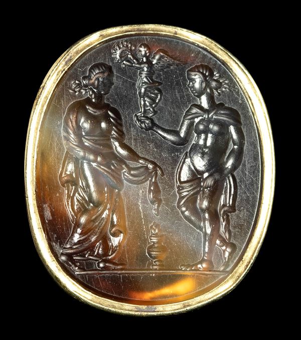 A large agate intaglio set in a gold ring. Allegorical scene.