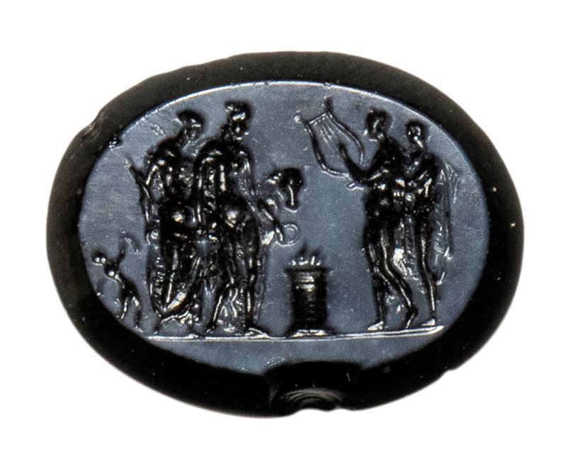 A glass paste impression. Sacrifice scene.