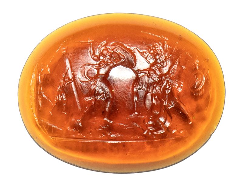 A large orange glass impression. Battle scene.