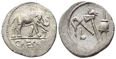 C. Giulio Cesare, Denario romano (military mint) con testa laureata di Caesar e scena con elefant...
