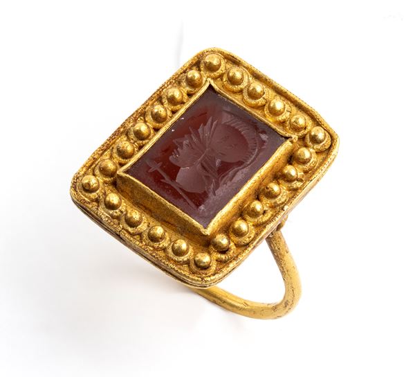 Archaeological-style gold and carnelian ring