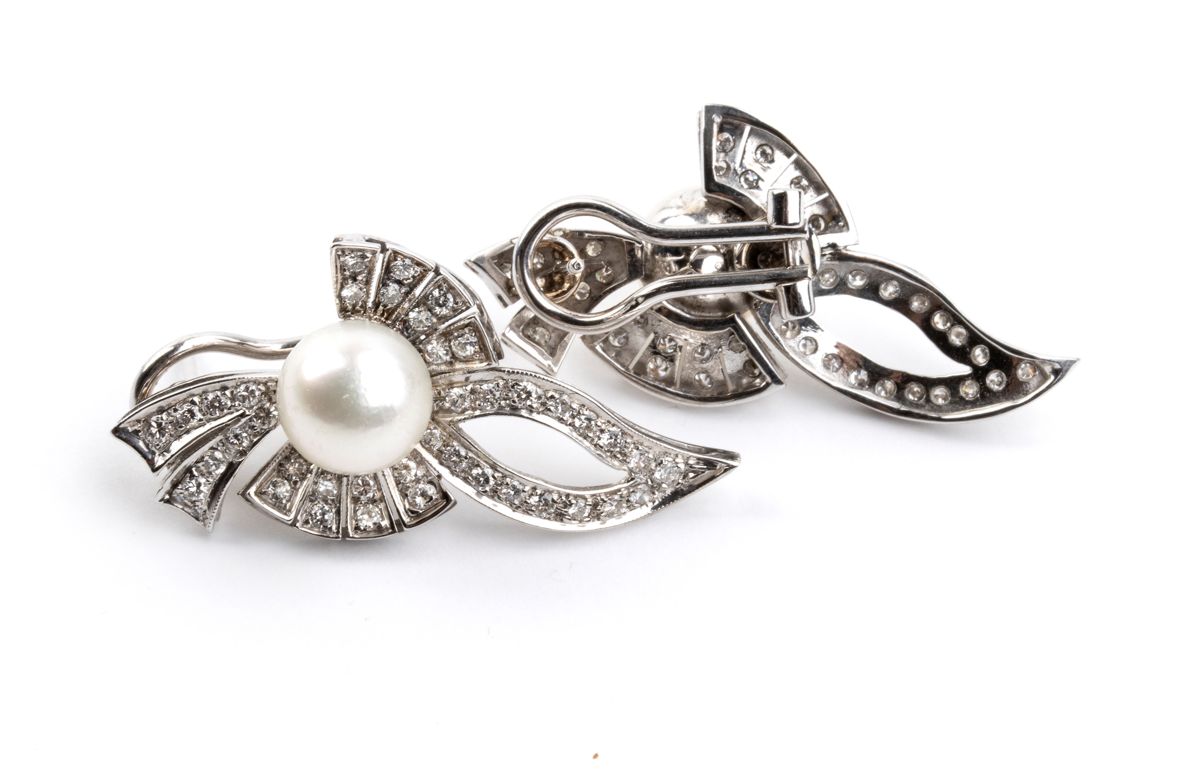 Orecchini in oro con diamanti e perle