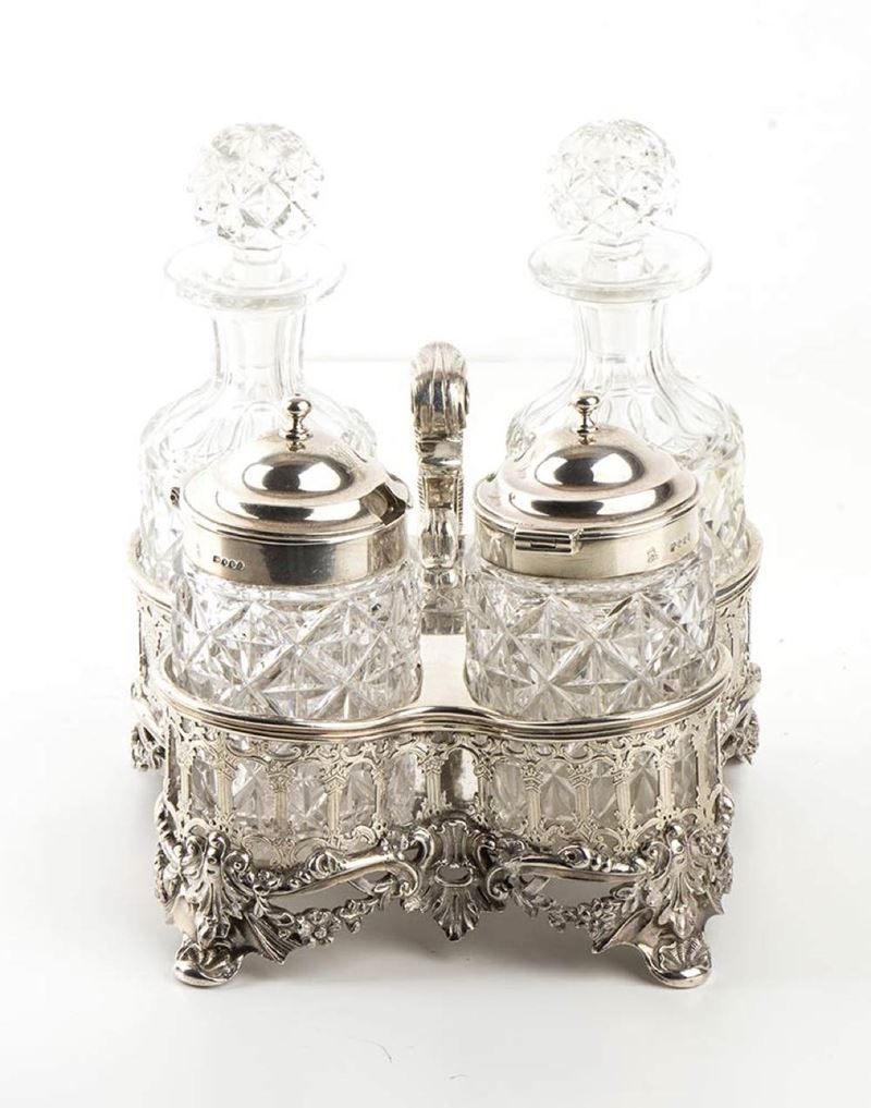 Rara cruet inglese William IV in argento con quattro bottiglie