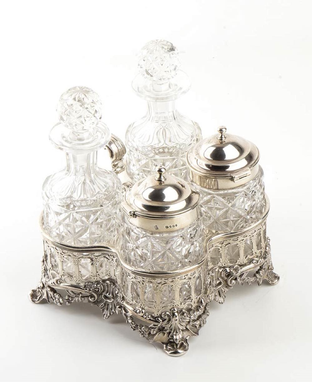 Rara cruet inglese William IV in argento con quattro bottiglie