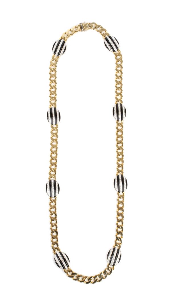 Long gold necklace with black enamel and diamonds 