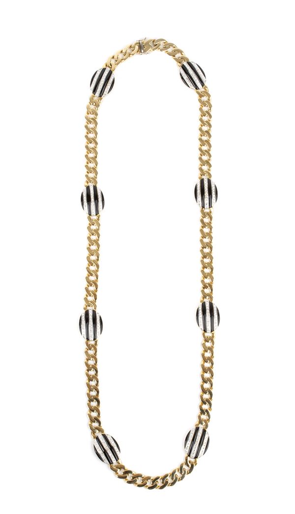 Long gold necklace with black enamel and diamonds 