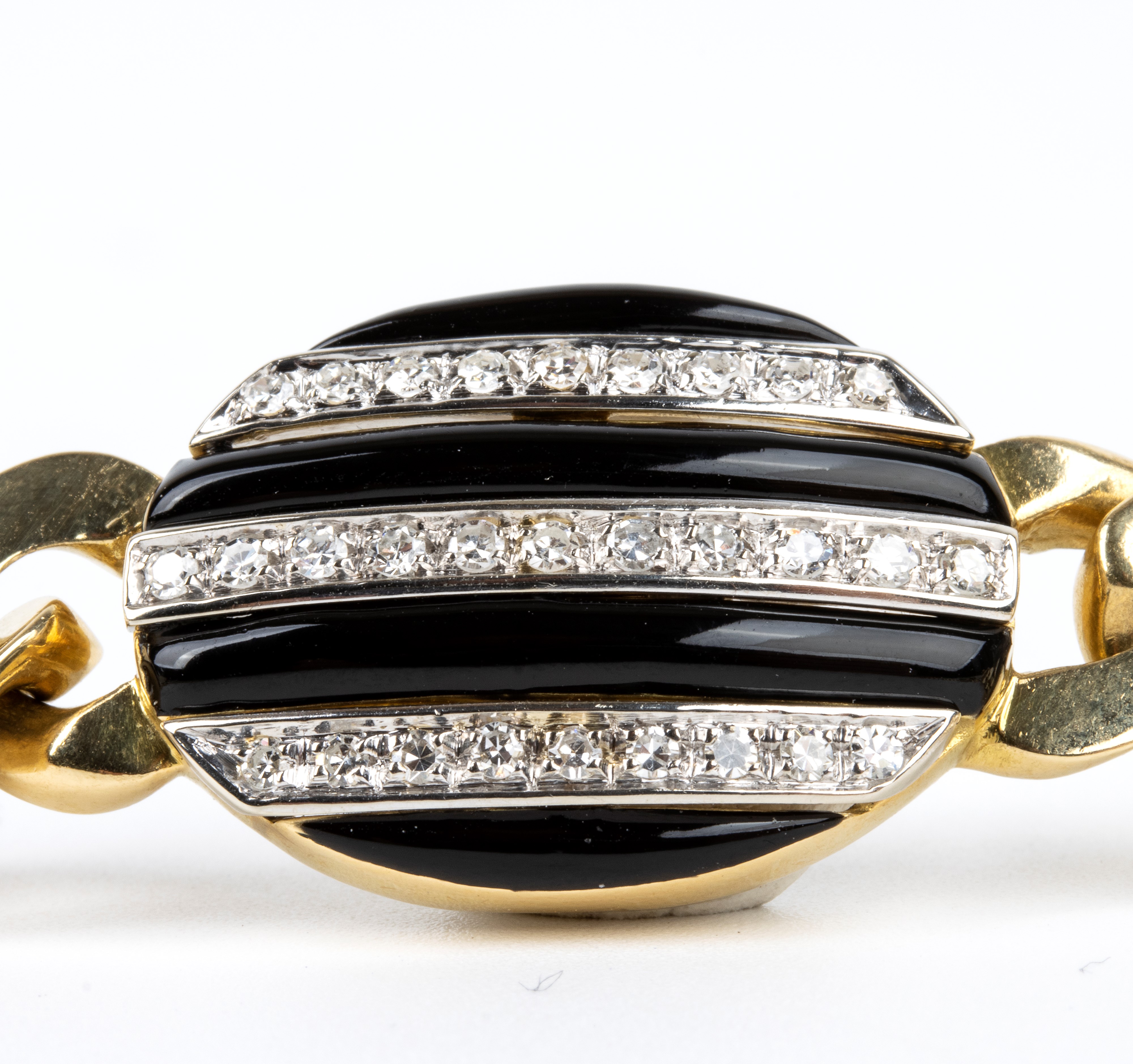 Lungo girocollo in oro con smalto neri e diamanti