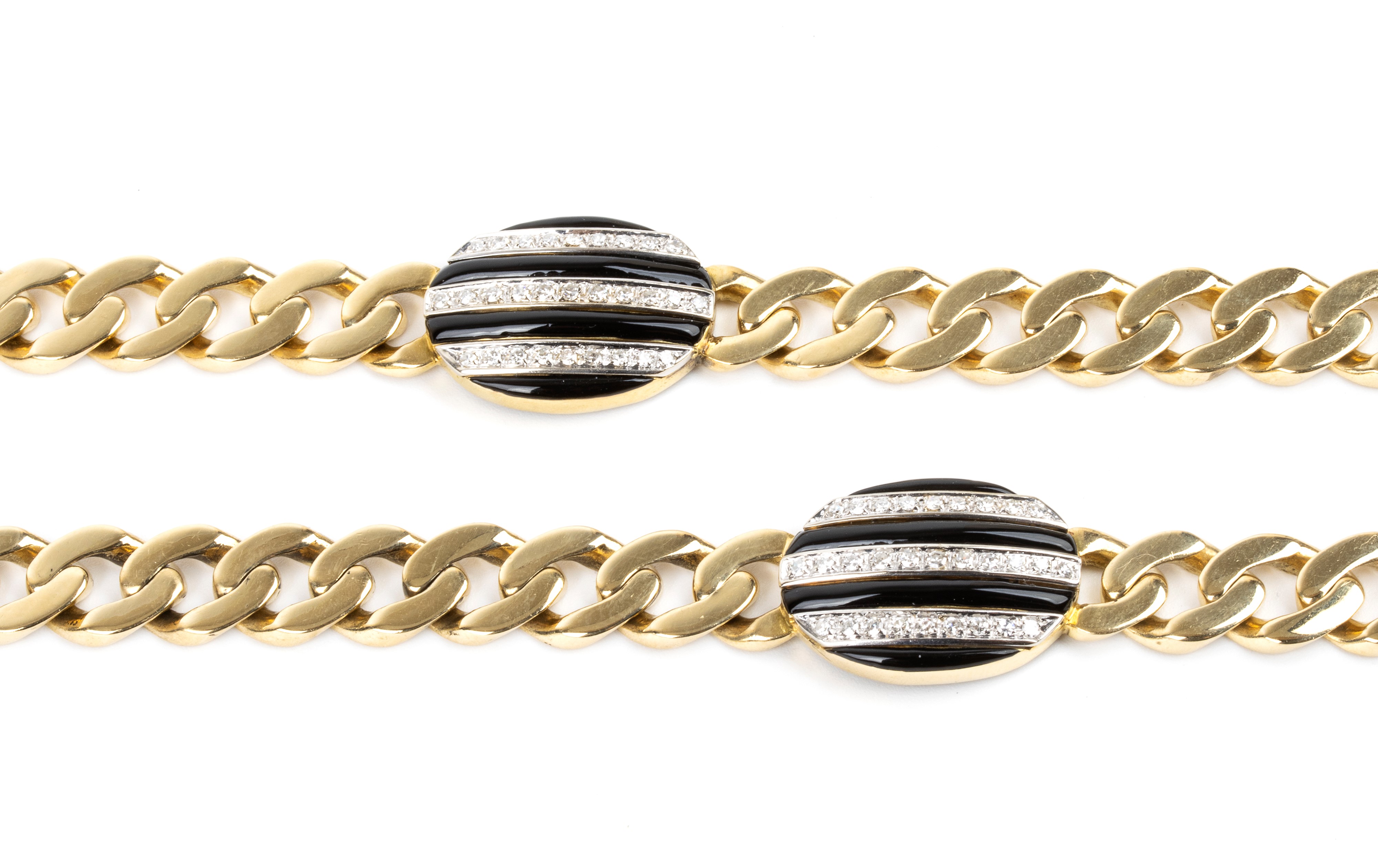 Lungo girocollo in oro con smalto neri e diamanti