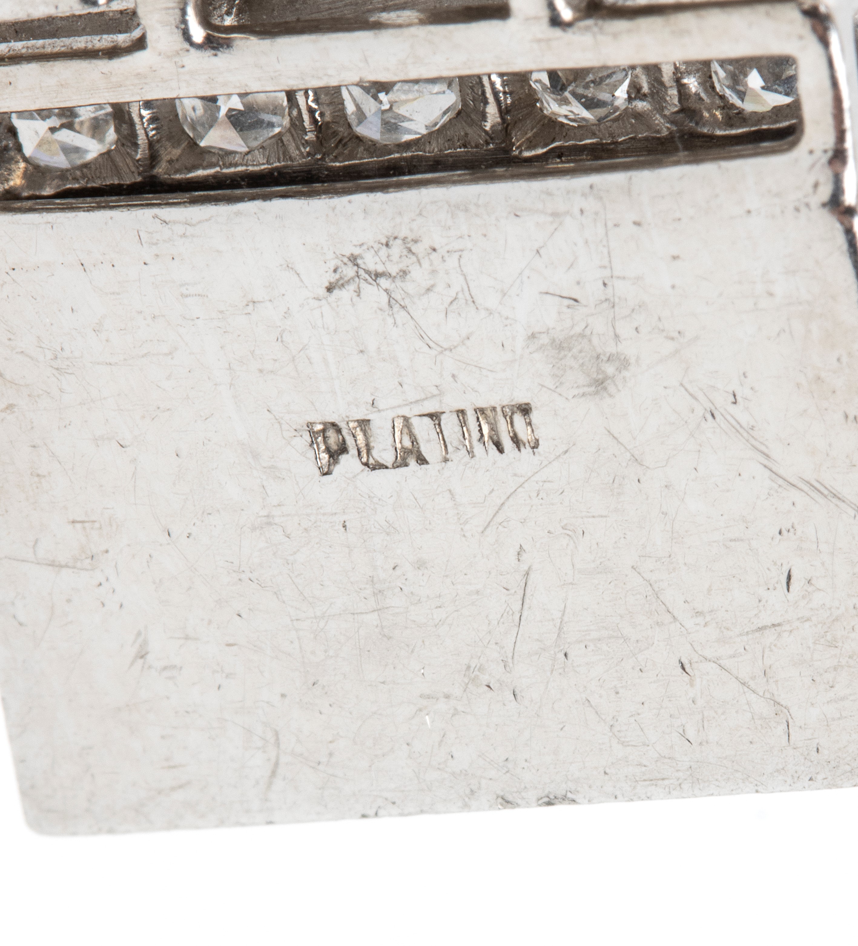 Bracciale Art Déco in platino con diamanti e smeraldo centrale