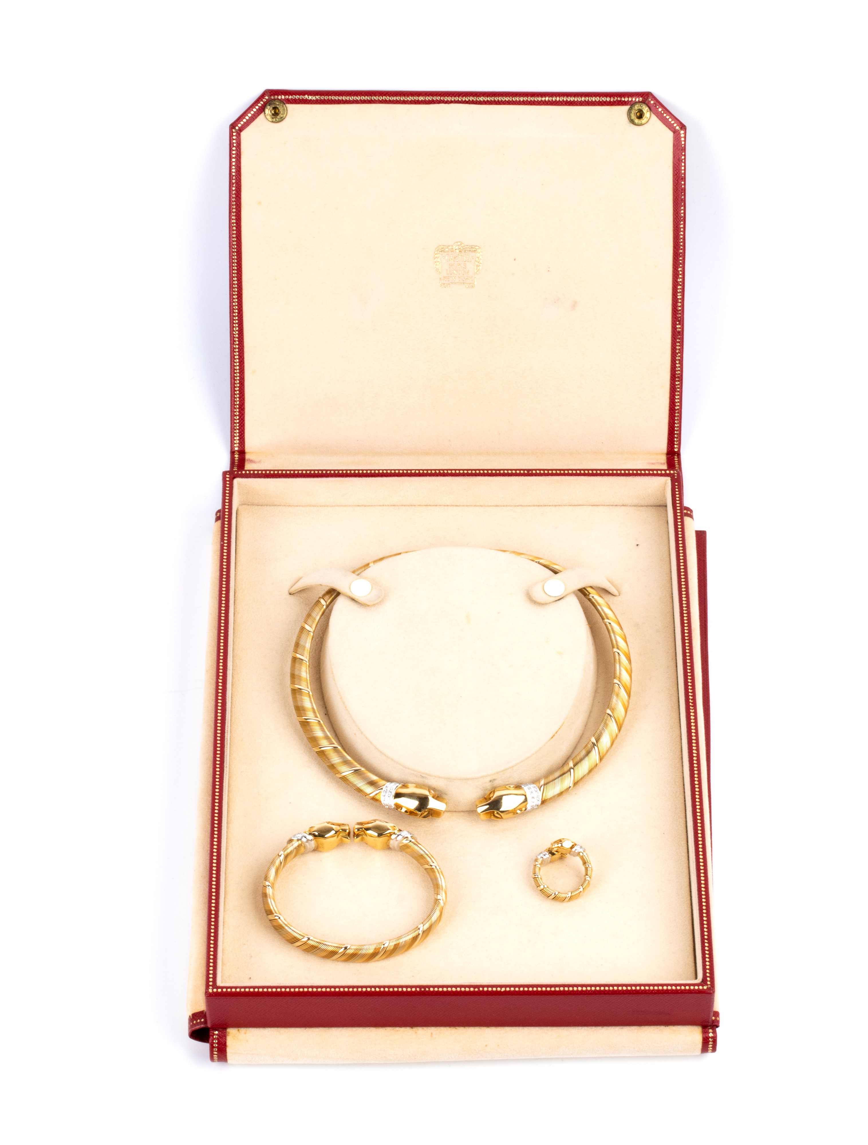Parure panthère composta da girocollo, bracciale ed anello in oro e diamanti