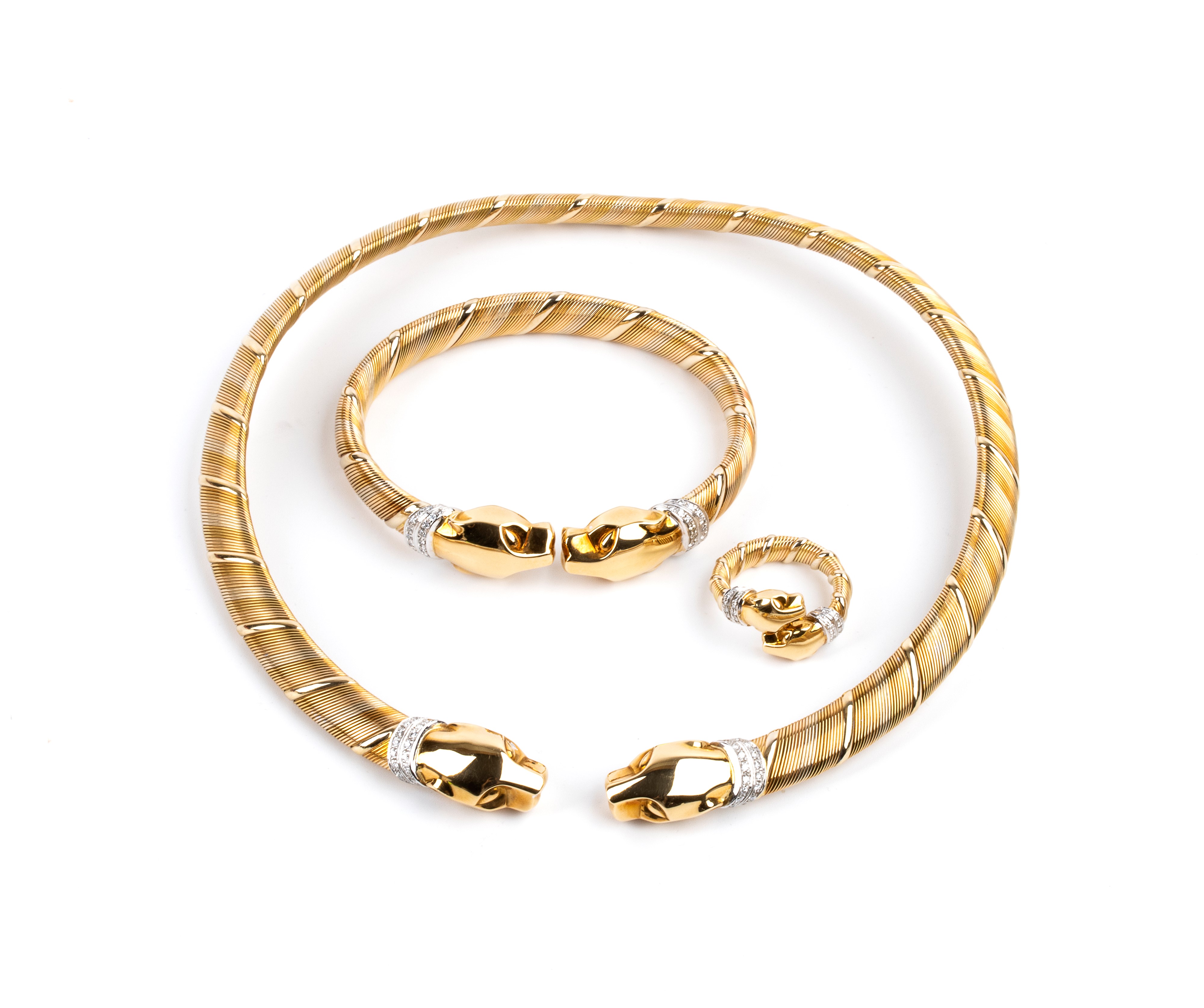 Parure panthère composta da girocollo, bracciale ed anello in oro e diamanti