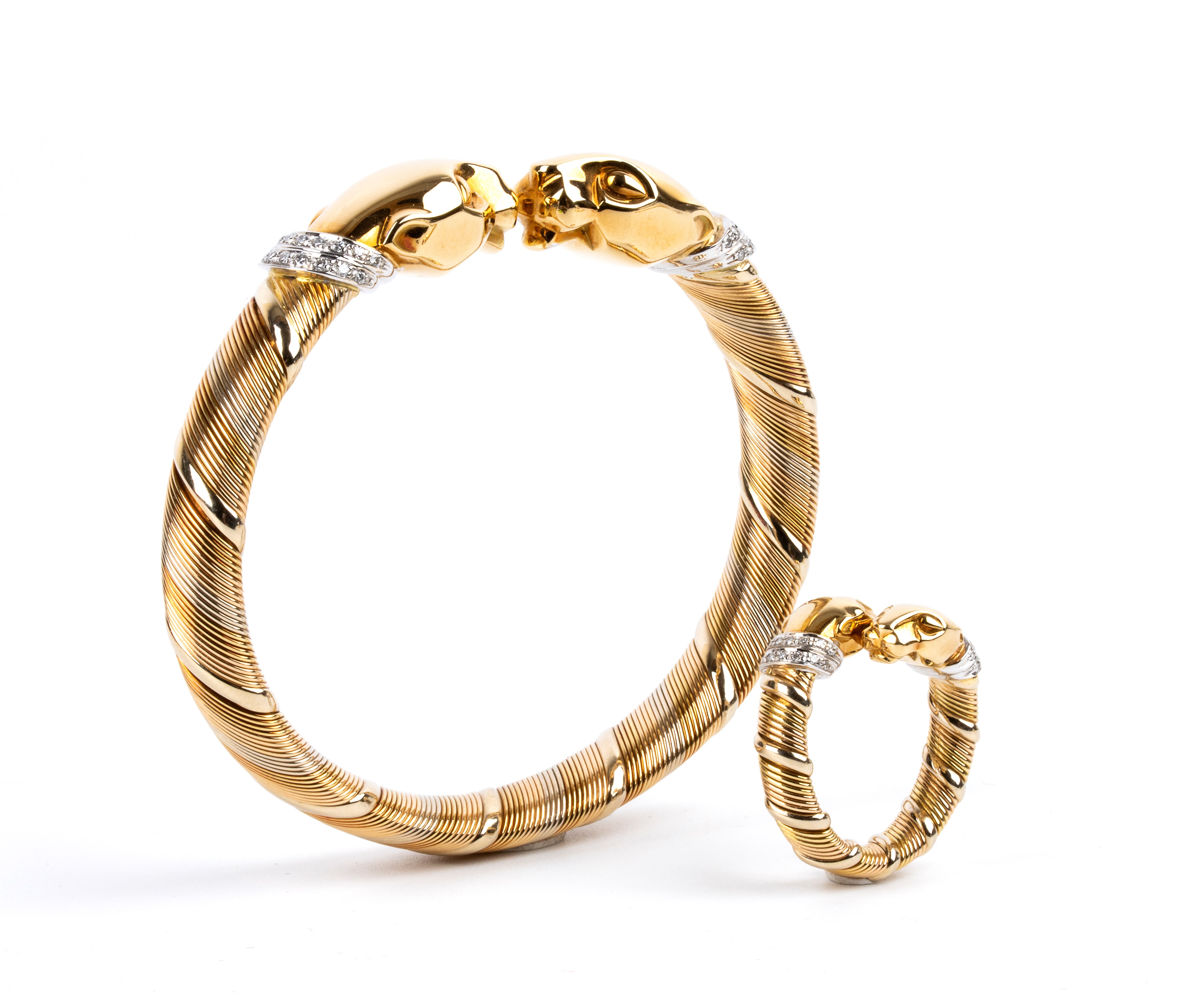 Parure panthère composta da girocollo, bracciale ed anello in oro e diamanti