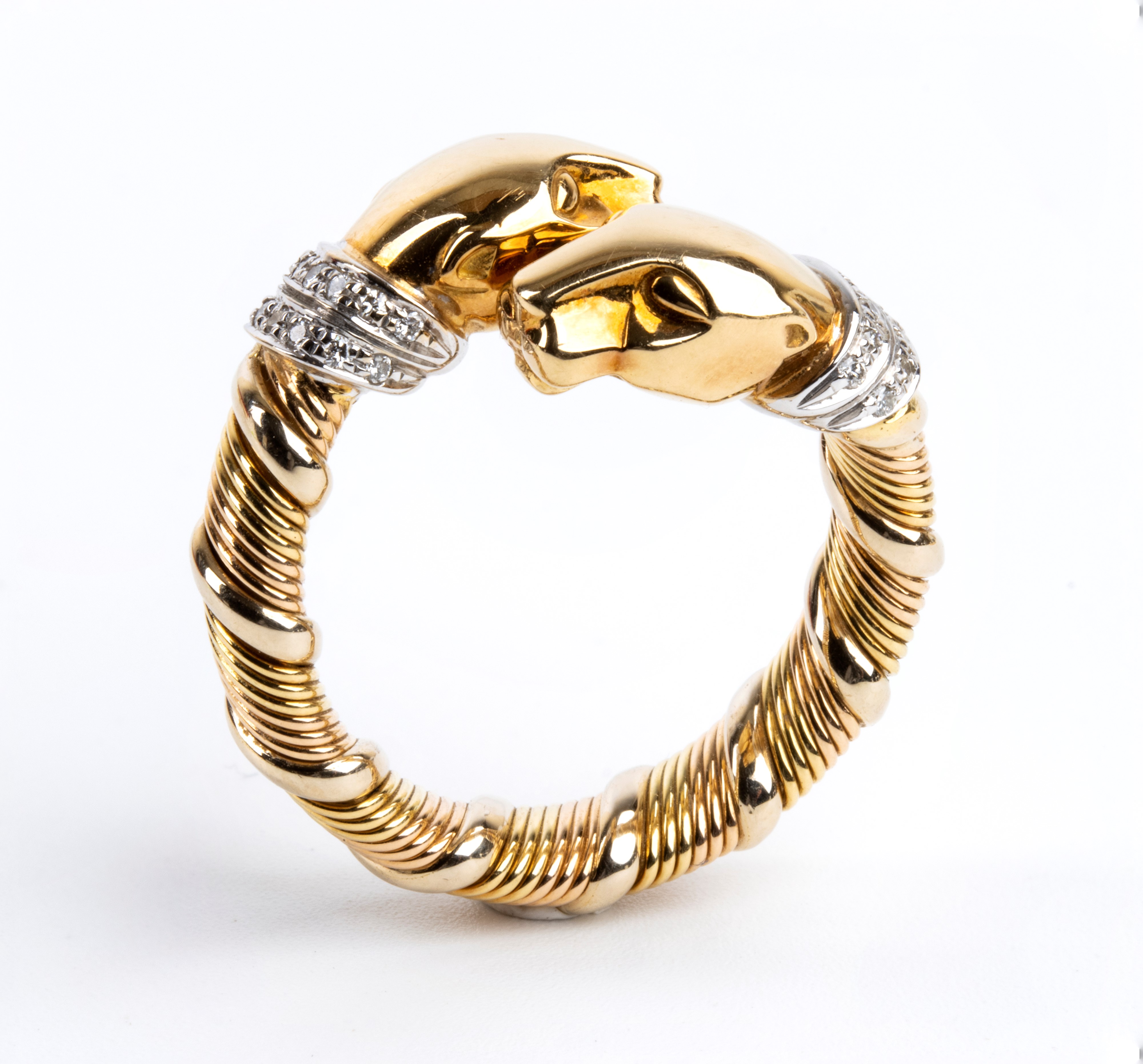 Parure panthère composta da girocollo, bracciale ed anello in oro e diamanti