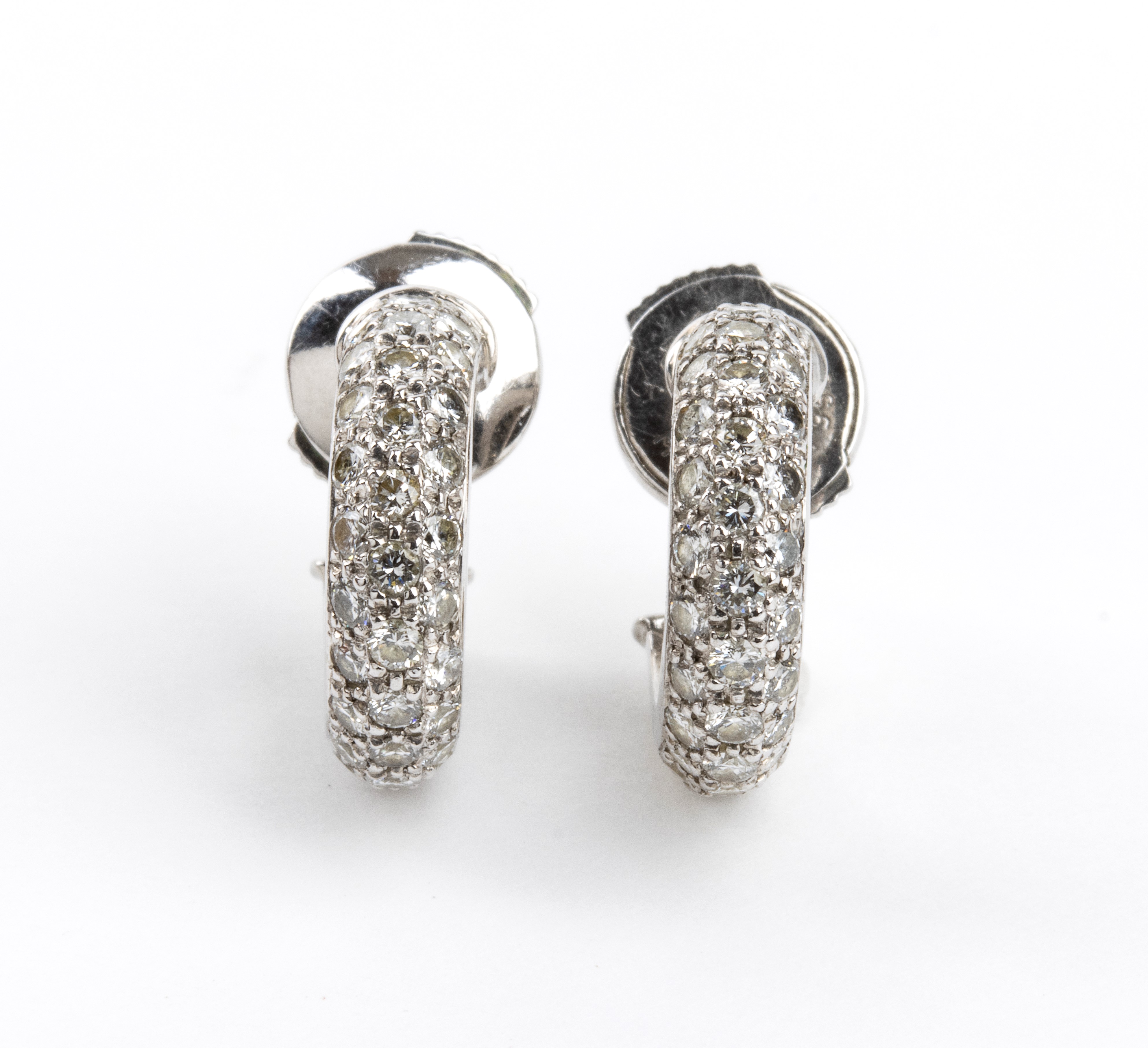 Collezione Etincelle de Cartier: orecchini in platino e diamanti